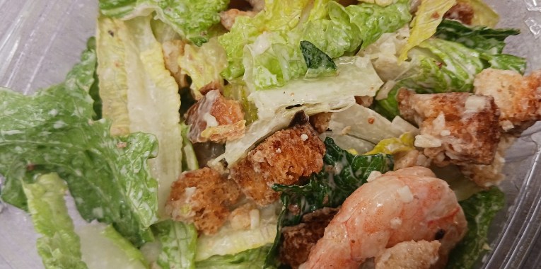 Shrimp Caesar salad with lemon pepper seasoning